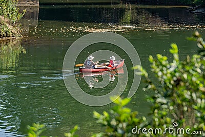 Father and Daughter enjoying a Day on the River Editorial Stock Photo